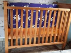 Toddler’s cot with mattress for sale